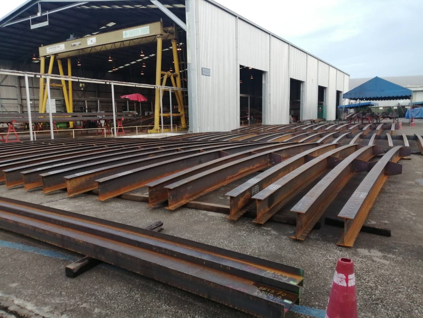 Structural steel sections in the fabrication yard