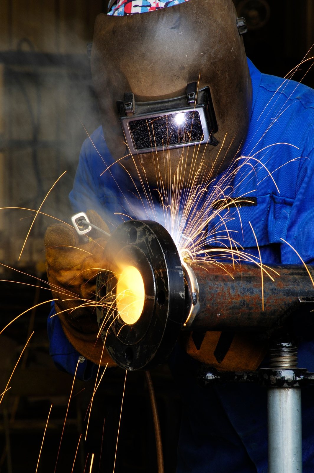 Grinding a fabricated component to finish