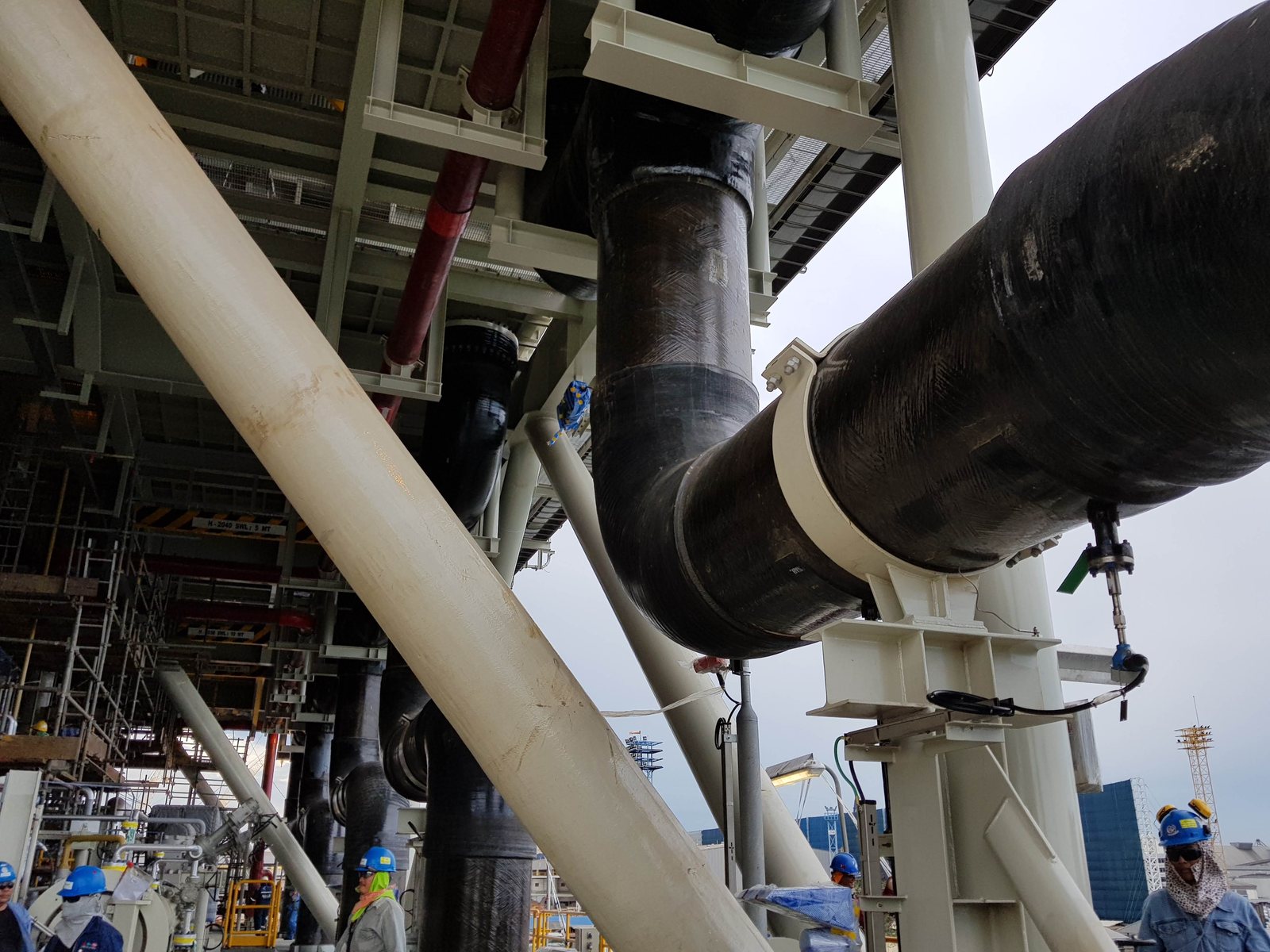 GRE pipework routed through a process unit