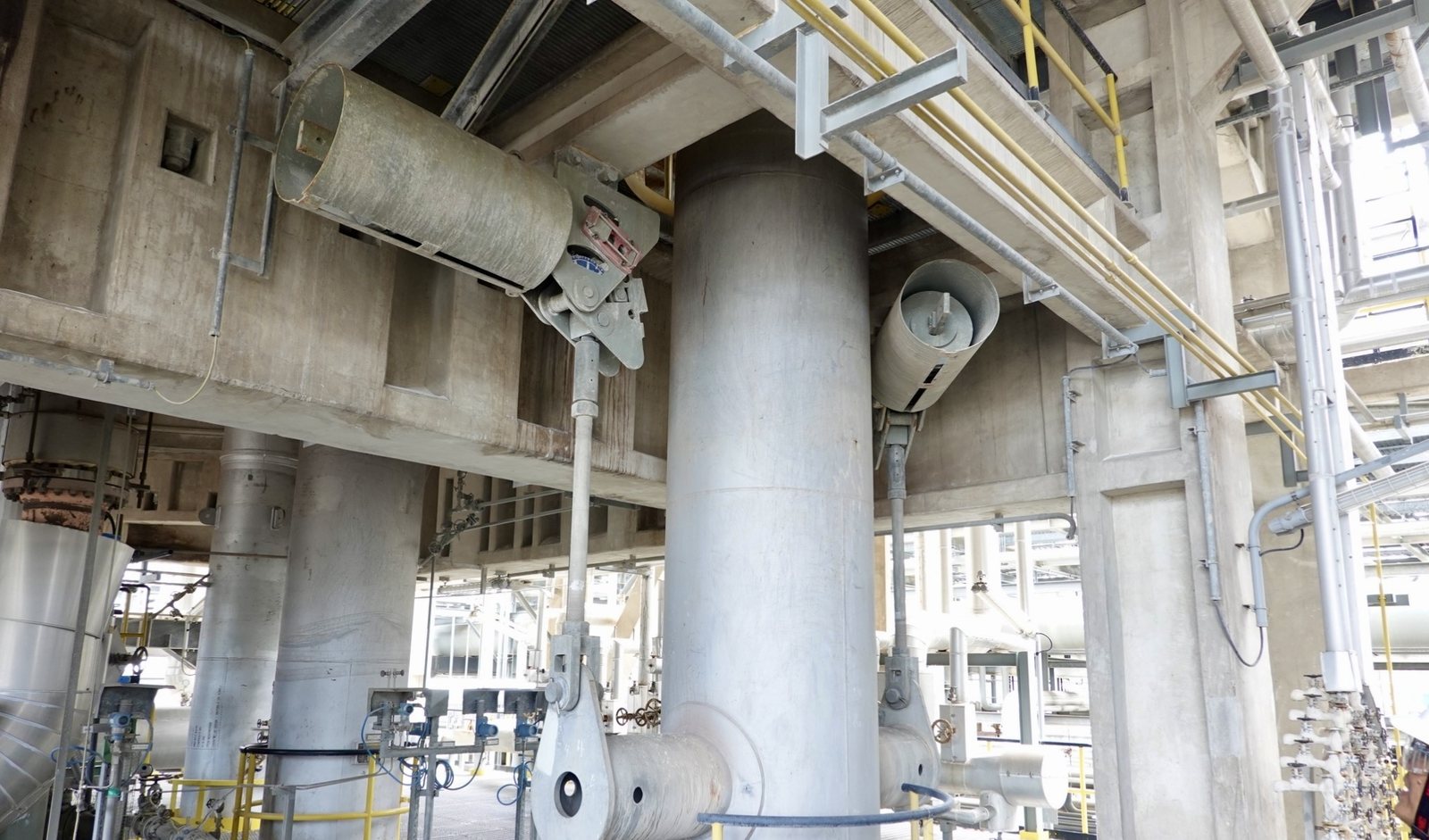 CAE ASIA engineers assessing installed pipe supports on site