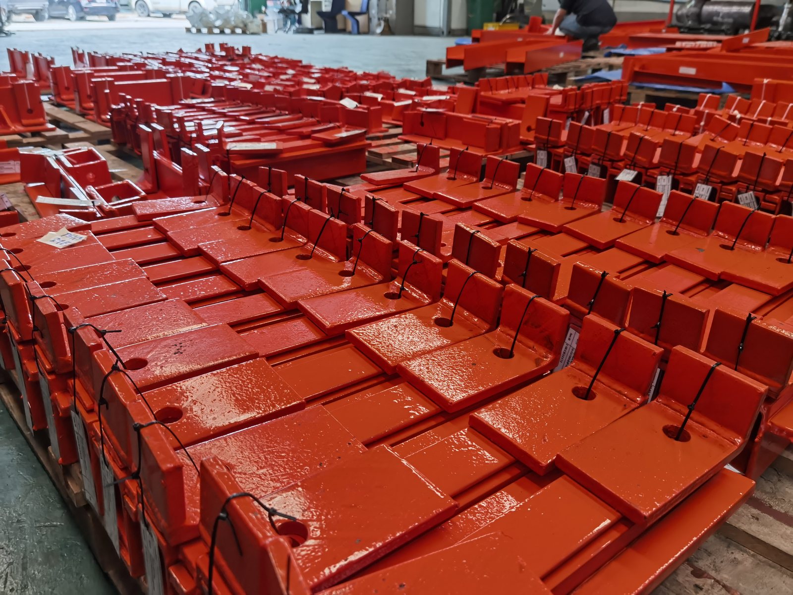 Painted pipe supports laid out after coating