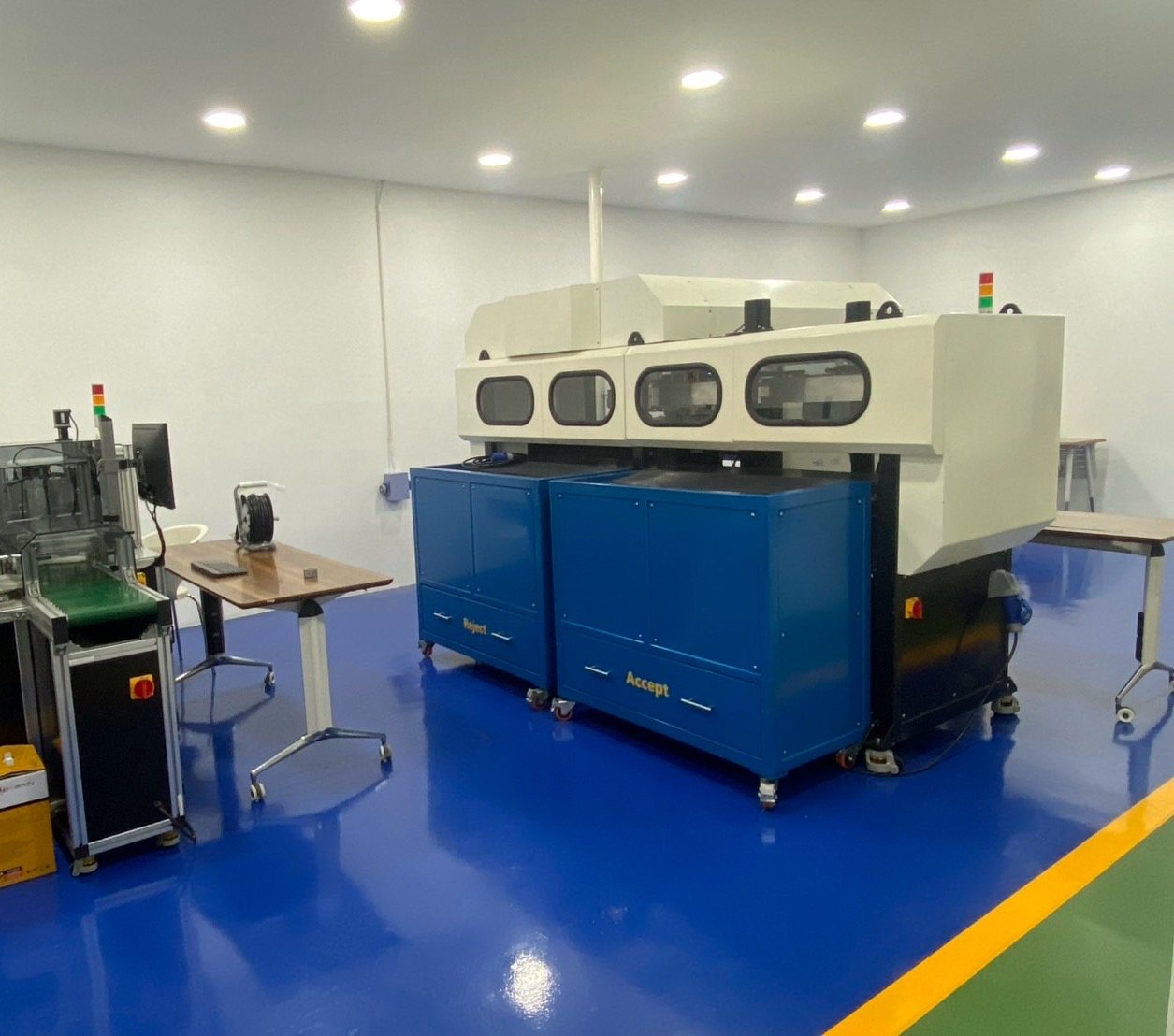 The stud bolt reconditioning and inspection line, with accept and reject stations