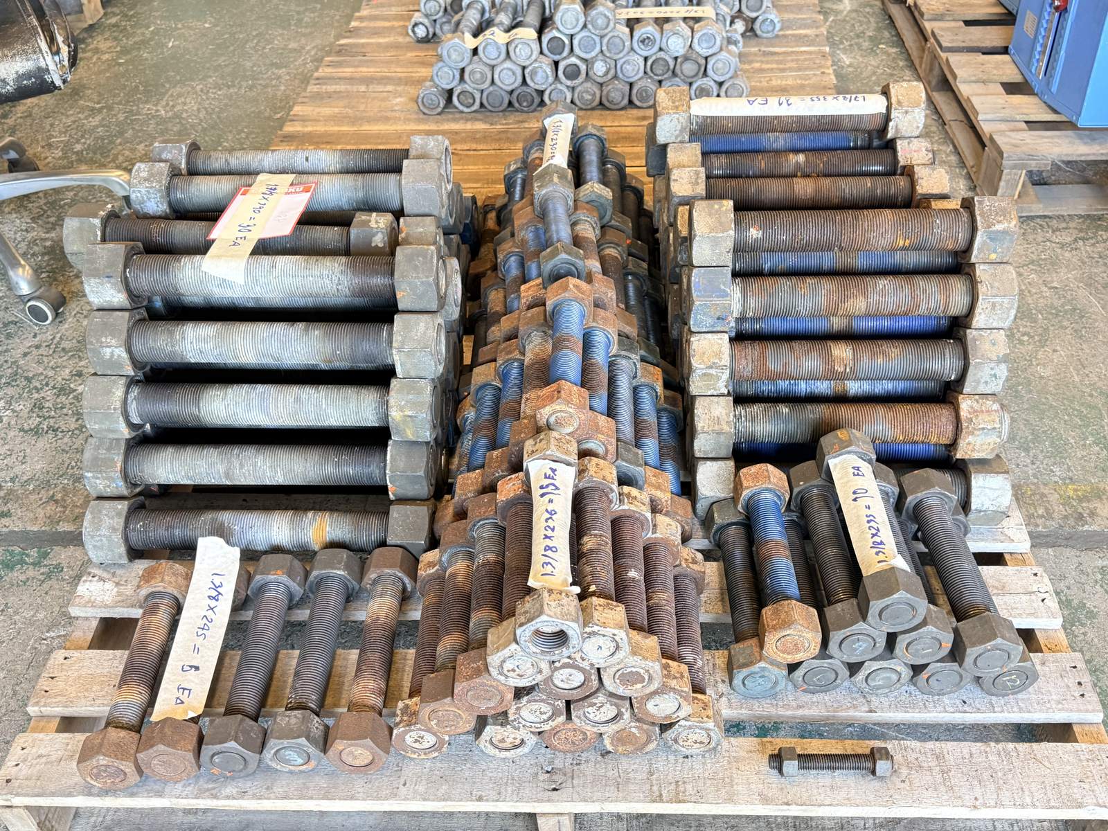 Sorted stud bolts laid out for assessment